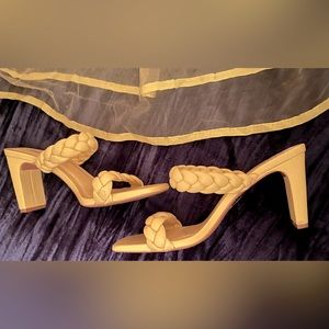 Yellow open toe Soda heels with single braided strap on top and large comfy heel